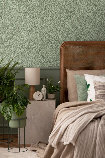 Hängematte mit schwarzem Metallgestell und gepolsterter Liegefläche