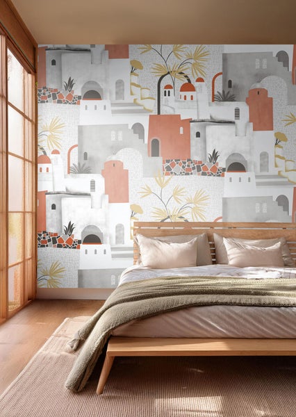 Schlafzimmer mit einer Fototapete mit Häusern