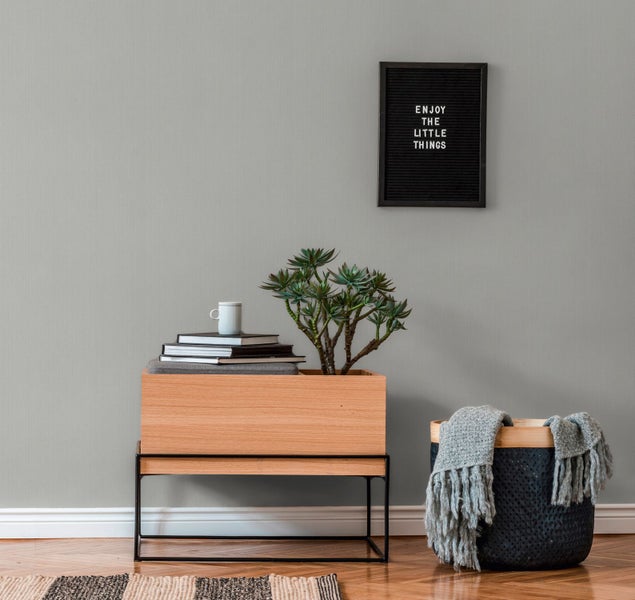 Tischleuchte mit plissiertem Lampenschirm