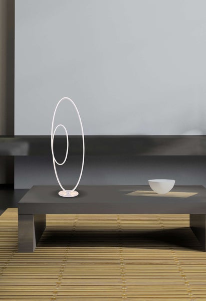 Dekorative Tischleuchte mit kreisförmigem Design auf einem Tisch