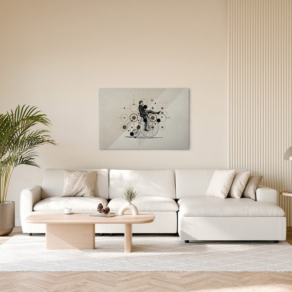 Wohnzimmer mit Sofa und Wandbild mit Mann auf Fahrrad