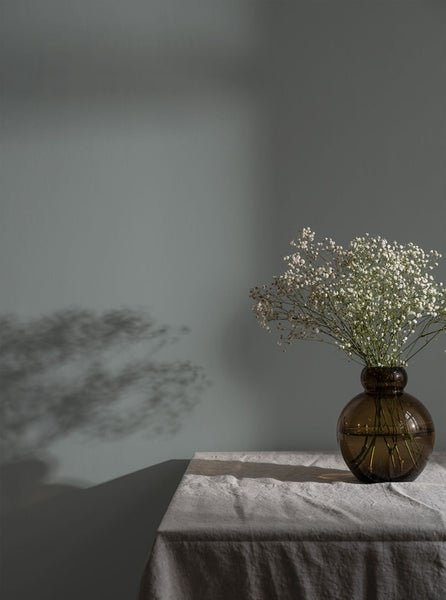 AMS Wanduhr mit rundem, braunem Rahmen und Ziffernblatt