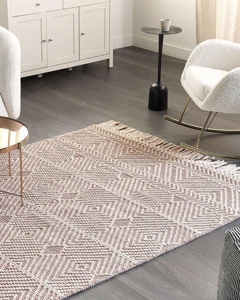 Dimensionszeichnung von zwei quadratischen Kissen, jeweils 50 cm breit und hoch, mit einer Dicke von 10 cm.