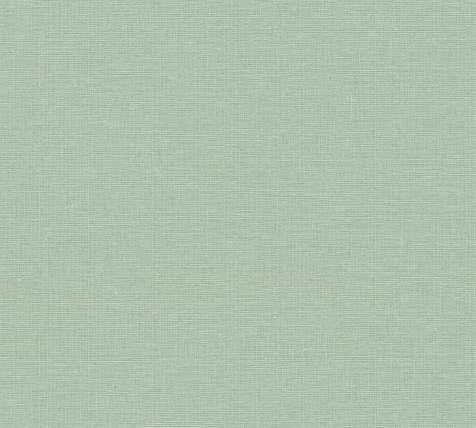 Wohnzimmer mit Sofa, Couchtisch, Stehlampe und Teppich