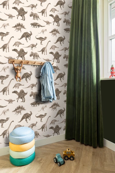 Tapete mit verschiedenen Dinosaurierarten als Muster