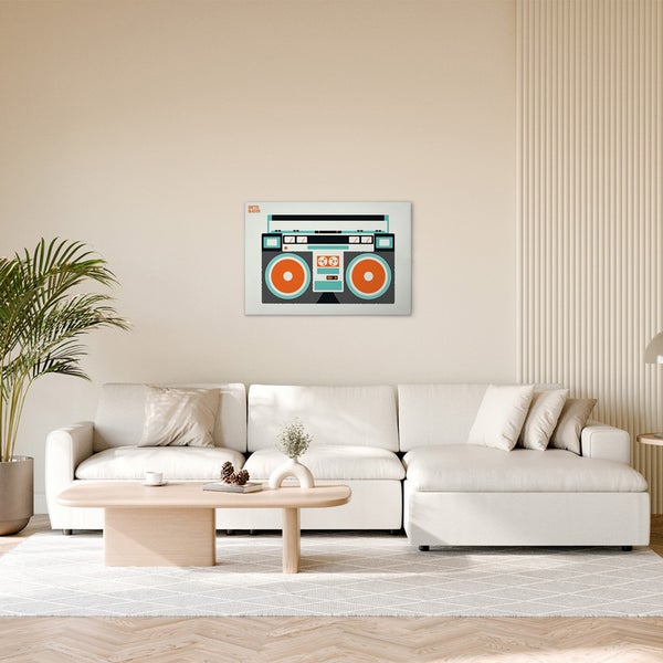 Dekorative Leinwand mit Ghettoblaster-Motiv über einem Sofa