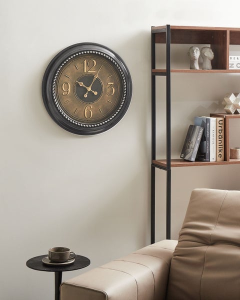 Abbildung einer Wanduhr mit einem Durchmesser von 55 cm und einer Tiefe von 5 cm