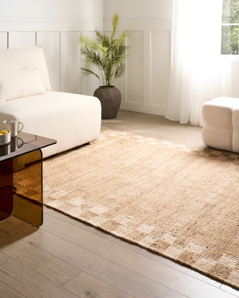 Teppich mit geometrischem Muster und Fransen
