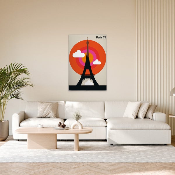 Gemälde mit Grafik der Silhouette des Eiffelturms und dem Schriftzug Paris 73 in einem Wohnzimmer
