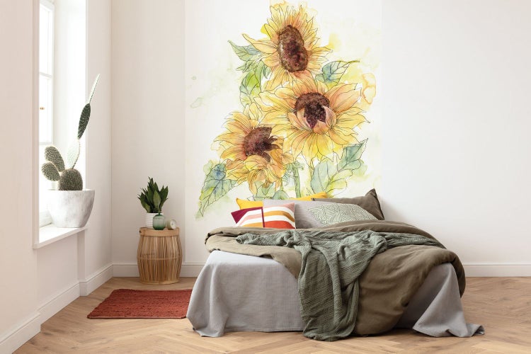 Schlafzimmer mit Wandtattoo mit Sonnenblumenmuster über dem Bett