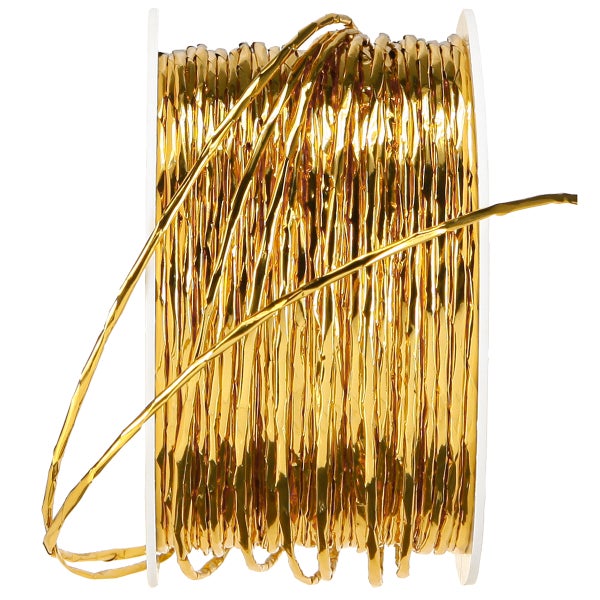 Goldener Dekodraht auf einer Spule.