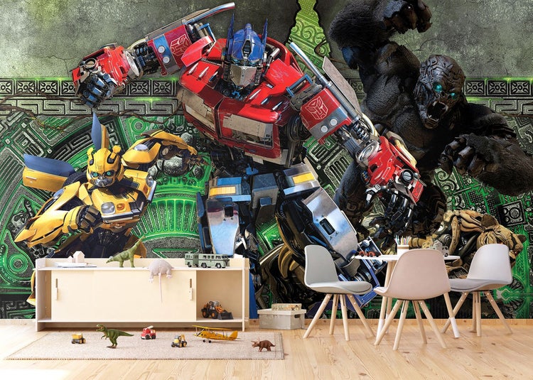 Fototapete mit Transformers Charakteren Optimus Prime und Bumblebee in einem Kinderzimmer mit weißen Möbeln und Spielzeug.