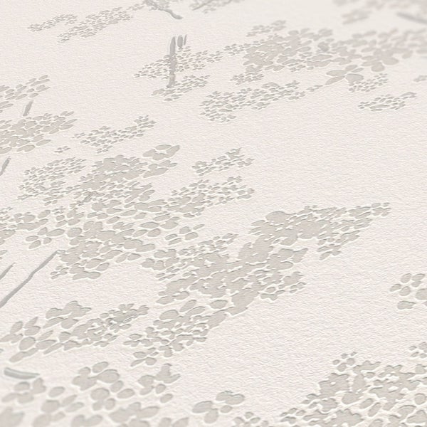 Holzliegestuhl mit floralem Muster