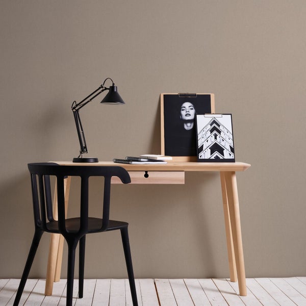 Nahaufnahme eines beigen Textilmaterials mit feiner Webstruktur