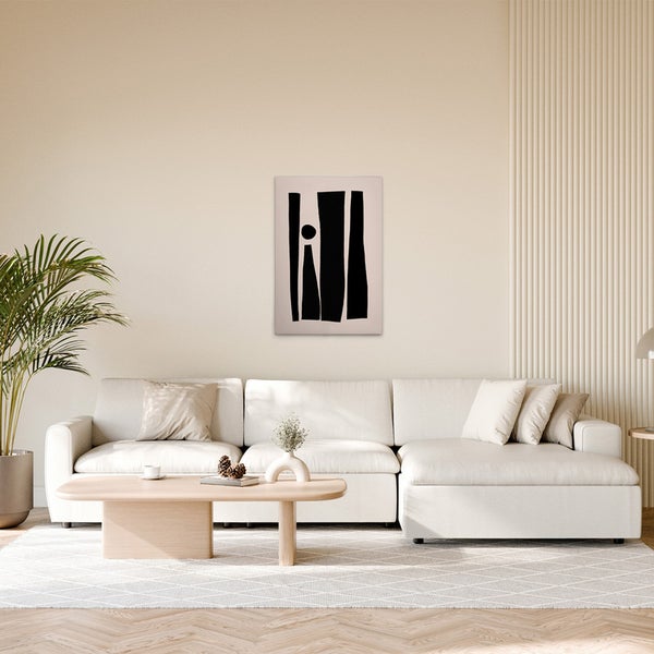 Wohnzimmer mit Ecksofa, Couchtisch und abstrakter Kunst an der Wand