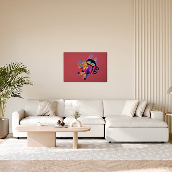 Gemälde mit abstraktem Motiv an einer Wand über einem Sofa