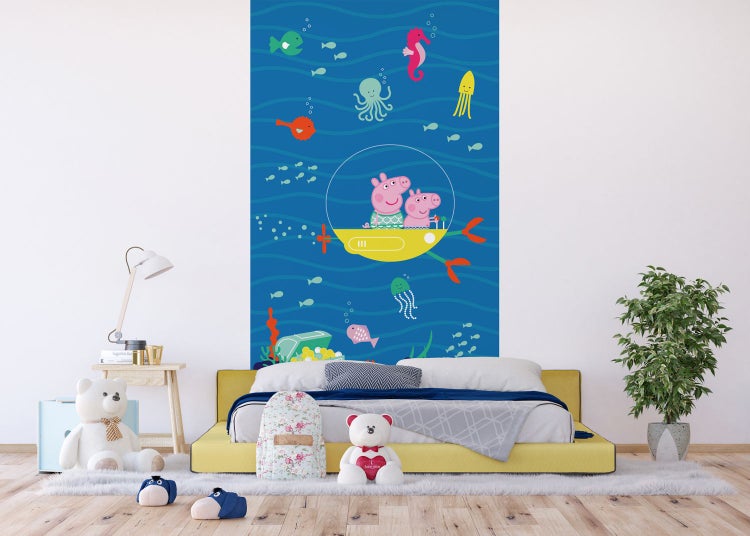 Dekoratives Kinderzimmer mit einer Fototapete mit Peppa Pig Motiv und Unterwasserwelt.