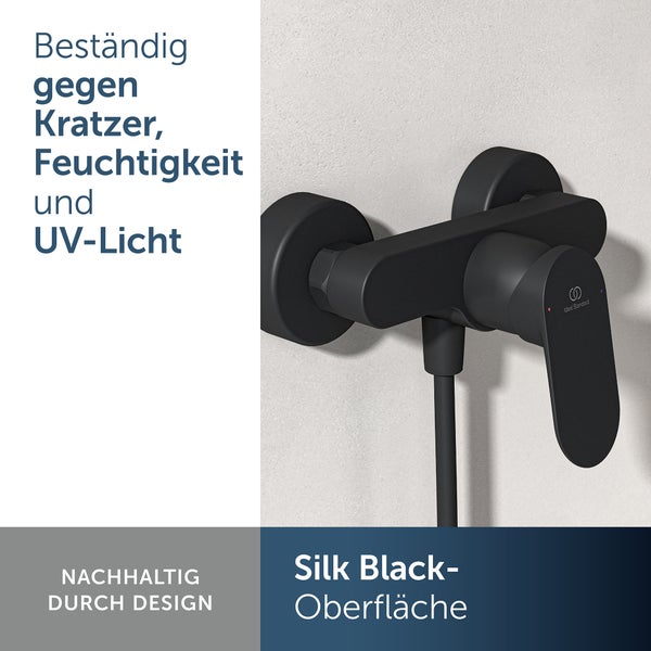 Wandarmatur mit Silk Black Oberfläche und Hebelmischer an einer Wand, beständig gegen Kratzer und Feuchtigkeit.