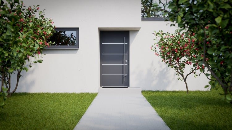 Fassade eines Hauses mit Haustür, Fenster und zwei Bäumen