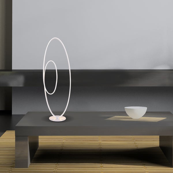Dekorative LED-Tischleuchte mit zwei ovalen Ringen auf einem Tisch