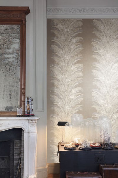 Gartenmöbel aus Polyrattan mit grauen Kissen