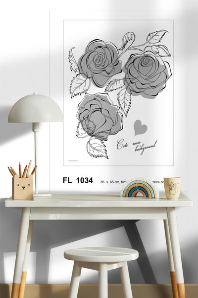 Dekoratives Rosenbild im weißen Rahmen mit den Maßen 85 x 65 cm auf einem Tisch.