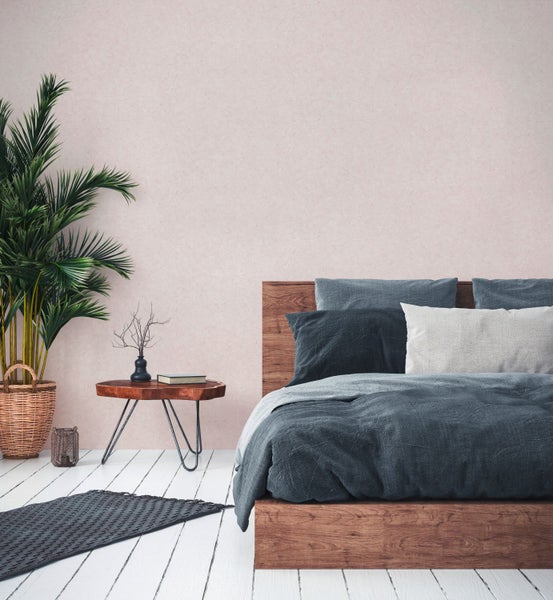 Braune Tischdecke aus Textil mit einer grünen wasserdichten Schicht.