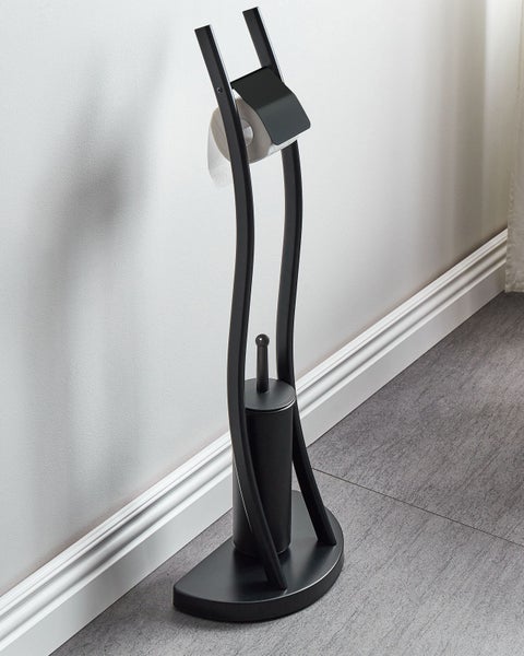 Schwarze Stand-Toilettengarnitur aus Metall mit Toilettenpapierhalter und integrierter Toilettenbürste in geschwungenem Design.