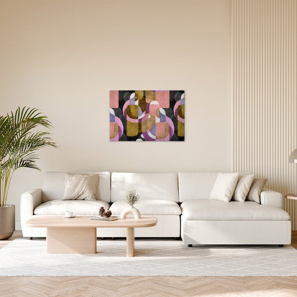 Dekoratives Wandbild mit abstraktem geometrischen Muster über Sofa