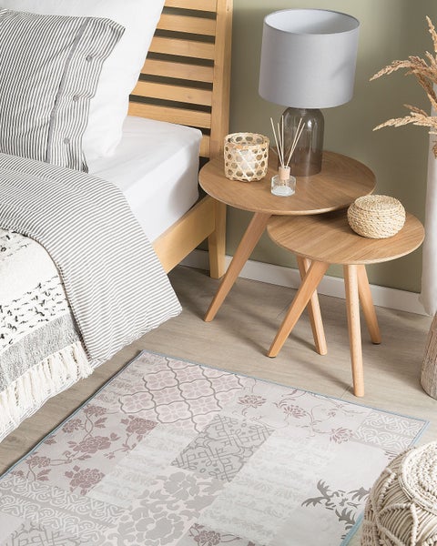 Teppich mit floralen und geometrischen Mustern im Patchwork-Design