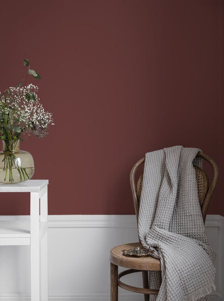 Grüne Schaukel mit Seilaufhängung