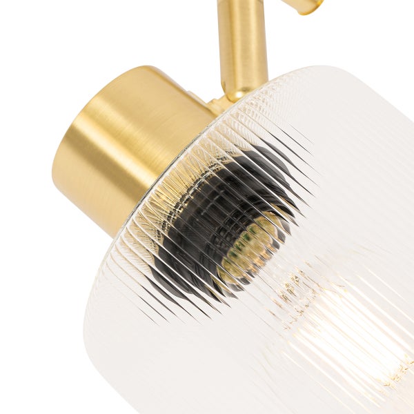 Detailaufnahme einer Deckenleuchte mit geripptem Glasschirm