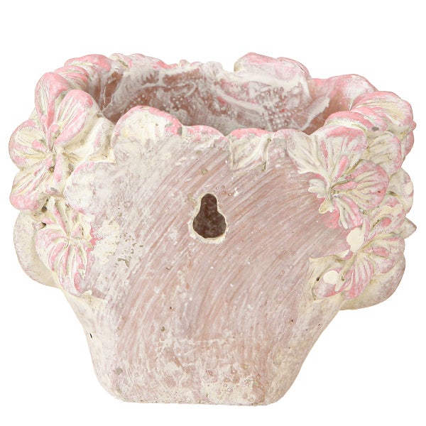 Wand-Pflanztopf aus Zement mit floralem Relief in Rosa und Beige, inklusive Loch zur Wandbefestigung.