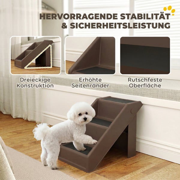Dreistufige Hundetreppe aus braunem Kunststoff mit rutschfesten Trittflächen und erhöhten Seitenrändern, kleiner weißer Hund nutzt die Treppe.