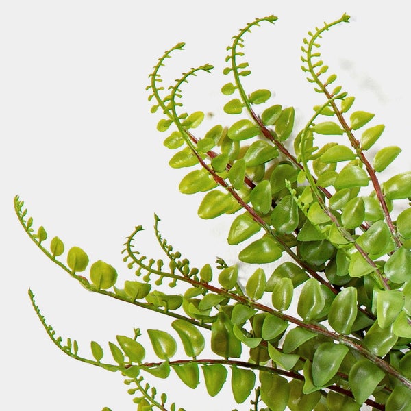 Künstliche Strelitzia mit orangefarbenen und violetten Blüten an einem grünen Stiel.