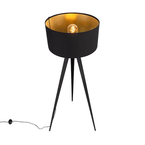 Schwarze Stehlampe mit Dreibeinstativ und goldener Innenseite