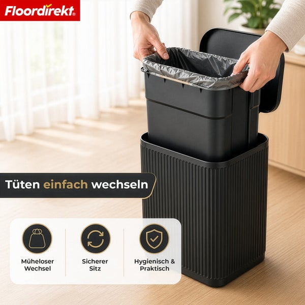 Floordirekt Logo. Schwarzer Abfalleimer mit herausnehmbarem Inneneimer für einfachen Mülltütenwechsel. Sicherer Sitz, hygienisch und praktisch.