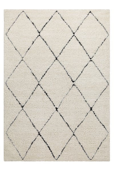 Hochflor-Teppich mit schwarzem Rautenmuster auf hellem Untergrund.
