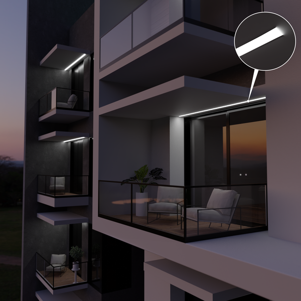 Außenansicht eines Mehrfamilienhauses mit Balkonen und LED-Profilen zur Beleuchtung