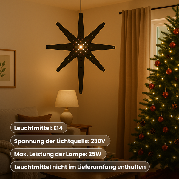 Dekorativer Stern als Pendelleuchte in einem Wohnraum neben einem Weihnachtsbaum.