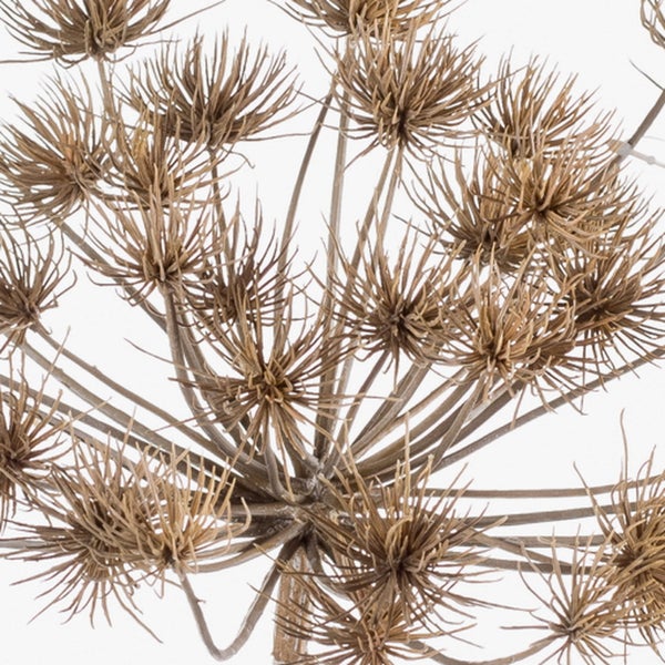 Künstlicher Zweig mit grünen Blättern und kleinen weißen Blüten zur Dekoration.