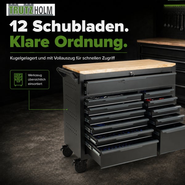 Trutzholm Werkstattwagen mit 12 kugelgelagerten Schubladen, Vollauszug und Holzarbeitsplatte, schwarz, fahrbar. Trutzholm Logo.