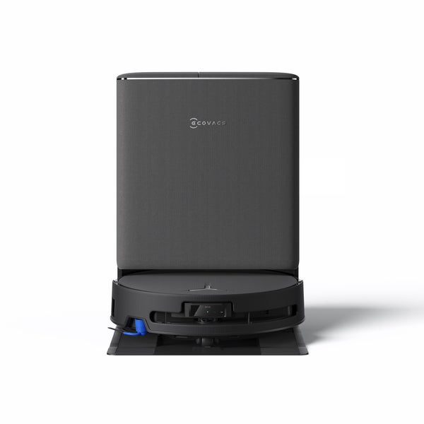 Saugroboter in Schwarz mit Absaugstation und Stofffront, Ecovacs Logo.