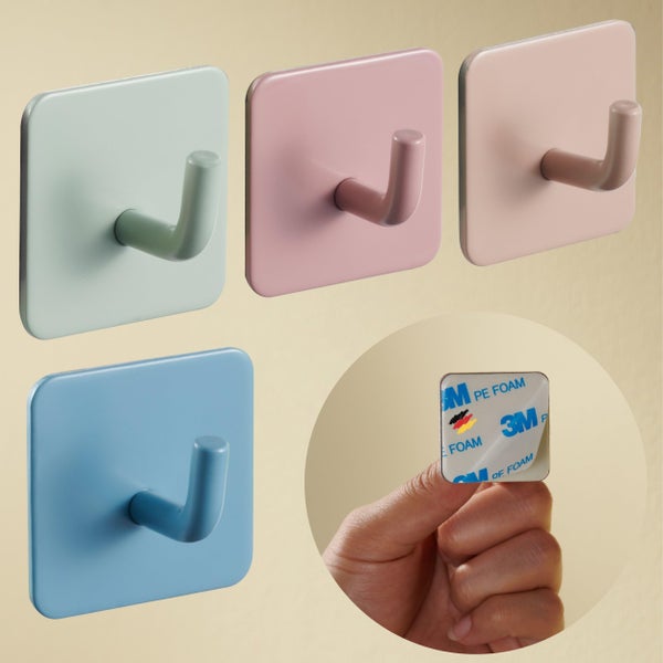 Selbstklebende Wandhaken mit quadratischer Basis und abgerundetem Haken, 3M Logo auf der Rückseite.
