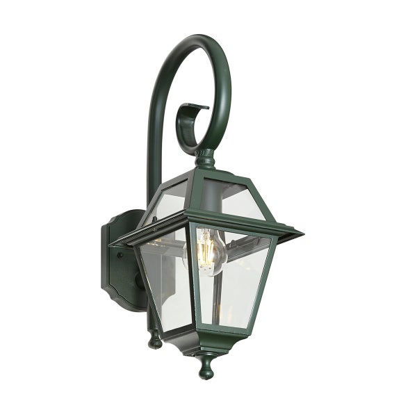 Klassische Außenwandleuchte in Laternenform mit sechs Glasflächen, geschwungenem Arm und sichtbarem Leuchtmittel.