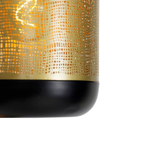 Dekorative goldfarbene Tischleuchte mit schwarzem Sockel