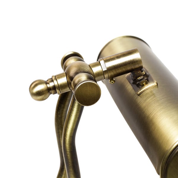 Detailansicht einer Tischleuchte mit Drehknopf und Metallelementen