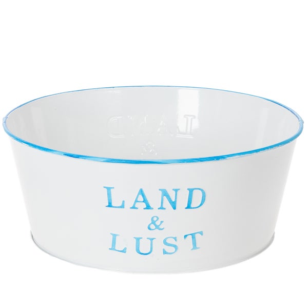 Runde weiße Metallschale mit blauem Rand und Land und Lust Schriftzug.