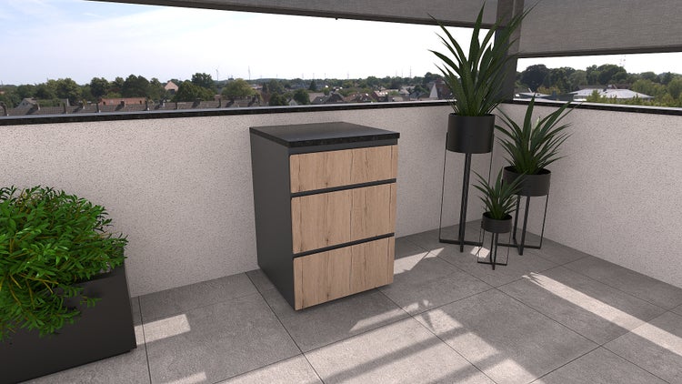 Badezimmermöbel mit drei Schubladen und Pflanzen auf einem Balkon
