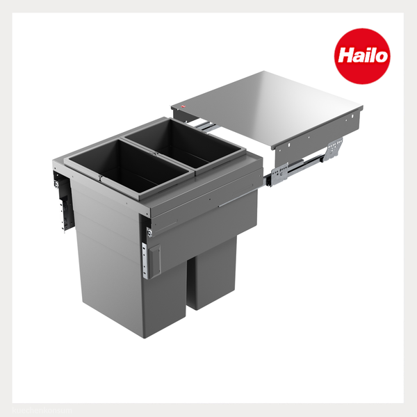 Hailo Mülltrennsystem mit zwei grauen Kunststoffbehältern, Metallrahmen und Vollauszug für den Küchenunterschrank. Hailo Logo.